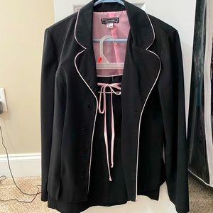 Black and pink suit. Jacket and skirt